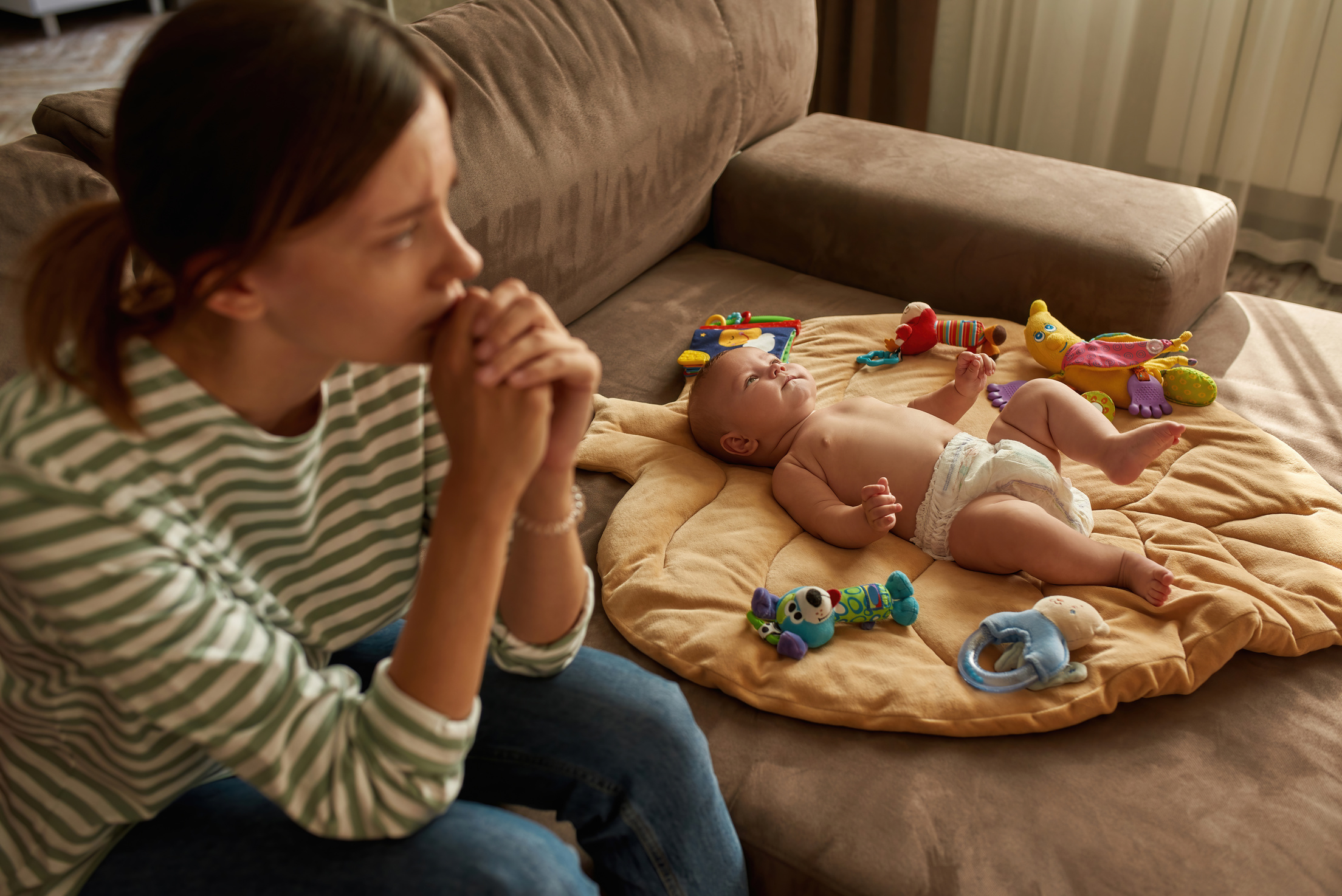 Mother is emotionally overwhelmed by her parental role